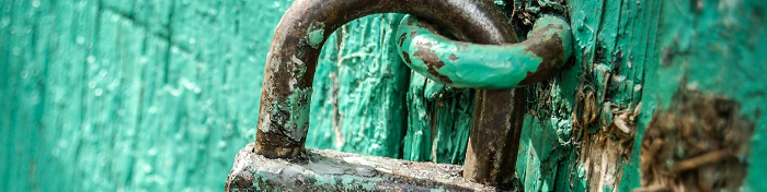 green door with padlock 